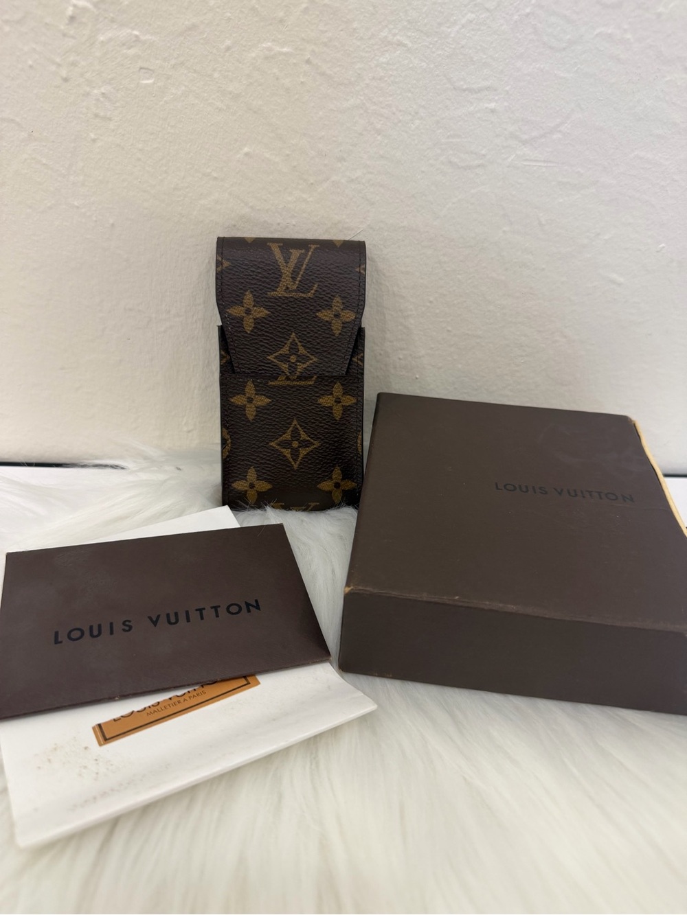 Louis Vuitton Monogram Canvas Phone Case in Brown and Gold